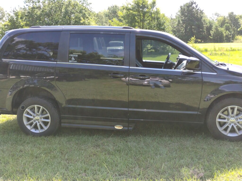 This image is of a Handicap Van and includes a view of the vehicle itself so customers can assess the van against their needs.